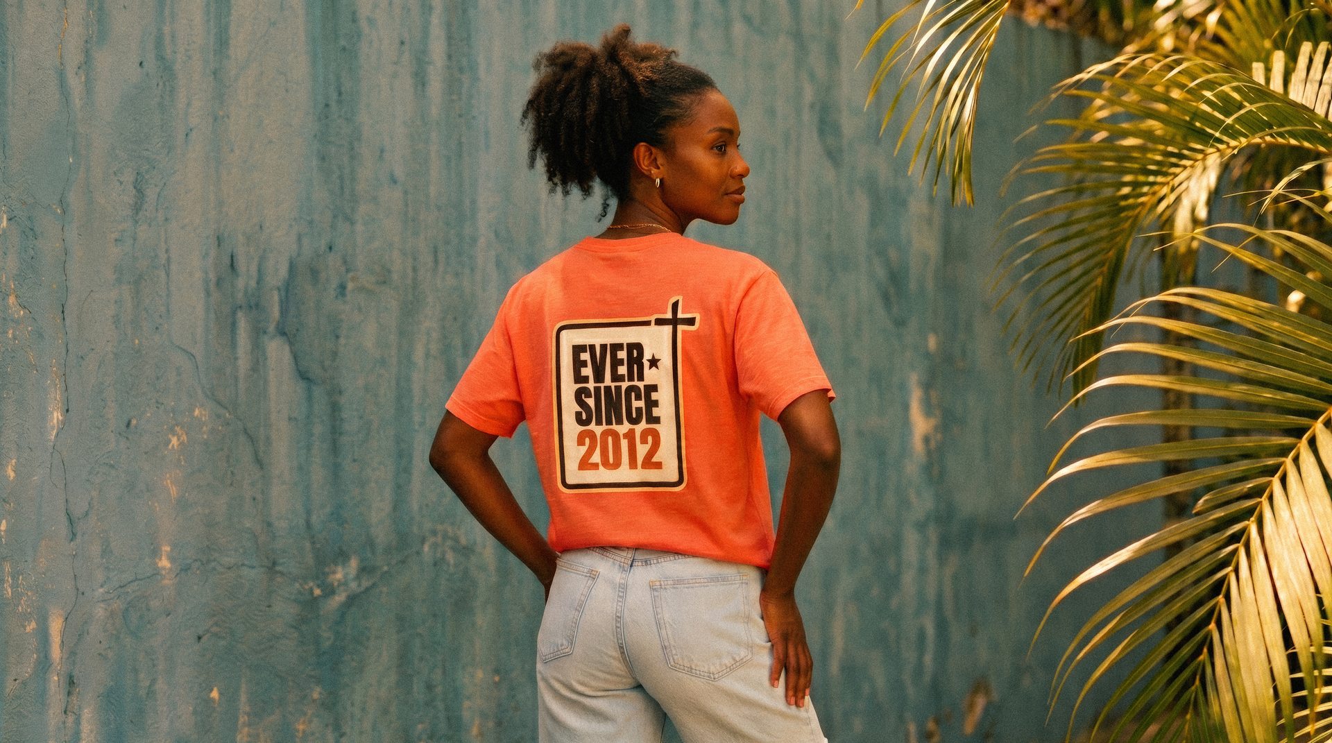 Back of an EverSince tee — the logo and salvation year design up close